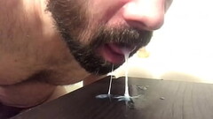 Licking up more of my cum Thumb