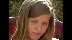NICE TEEN PLAYING ALONE IN THE GARDE Thumb