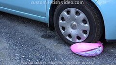 Bursting a float with a car tire Thumb