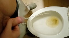 In college, a guy with a big and thick dick waited 3 hours in line for the toilet and pissed from th Thumb