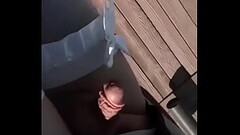 Sissy in public smoking wearing lingerie with tiny penis exposed Thumb