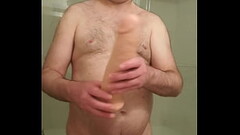Nude Martin Lavall&eacute_e installs his pink cock cage and compares it with his 10 inch dildo Thumb