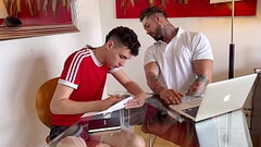 The English teacher gives an oral exam to his student. Thumb