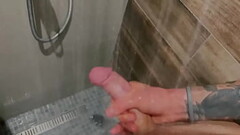 Pulsing DICK under the shower spray Thumb