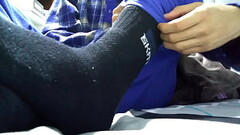 Playing with my black socks and barefeet before rest Thumb