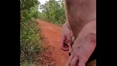 Ginger guy pissing outside Thumb