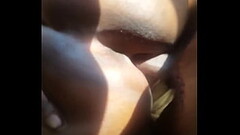 Chocolate getting a thumb in her butt Thumb
