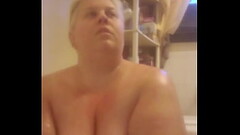 Wife bathing  showing huge tits Thumb