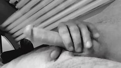 Tattooed muscle guy strokes his big white cock Thumb