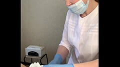 The patient CUM powerfully during the examination procedure in the doctor'_s hands Thumb