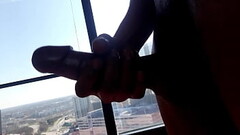 AT WORK ON THE 25TH FLOOR PLAYING WITH CURVE Thumb