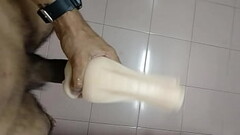 Jerking off my thick dick with a flesh light Thumb