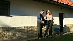 Cheerful chick Fucks with two men in the village Thumb