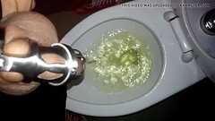 Tomsfag pissing in the public toilet while locked in a chastity cage Thumb