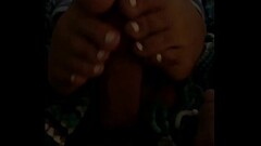 Teasing my dick with her toes while she on the phone Thumb