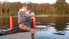 two hot gays kisses each other  with passion outdoor Thumb