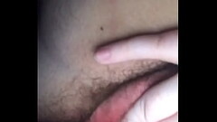 Three fingers stuffed deep in hairy pussy. Thumb