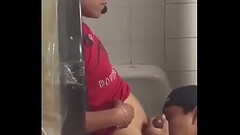 Pinoy cock sucking in public toilet. Thumb