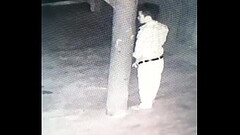 Cambodian man pissing on spy Thumb