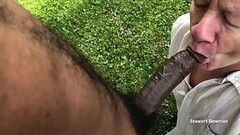 Stewart Sucks off a Beautiful and HUGE Big Black Cock outdoors in his private back yard Thumb