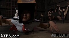 Clamped beauty gets harrowing cookie pleauring Thumb