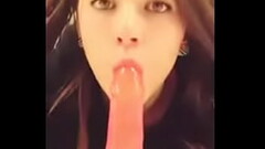 Beautiful eyes girl sucking dildo Thumb