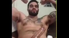 big bearded guy jerking Thumb