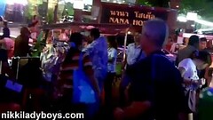 Walking street with Ladyboys working in Nana Plaza Bangkok Thumb