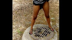 Sexy Ebony Peeing Outside Sex Shop Thumb