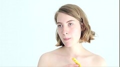 Teasing blonde babe playing with a banana Thumb