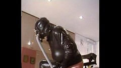 Roxina2003EncasedRubberAndGasmask110203XXXL.MPG Thumb